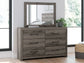 Graystorm Queen Panel Bed with Mirrored Dresser and Chest
