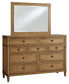Sharlance California King Upholstered Panel Bed with Mirrored Dresser and Chest