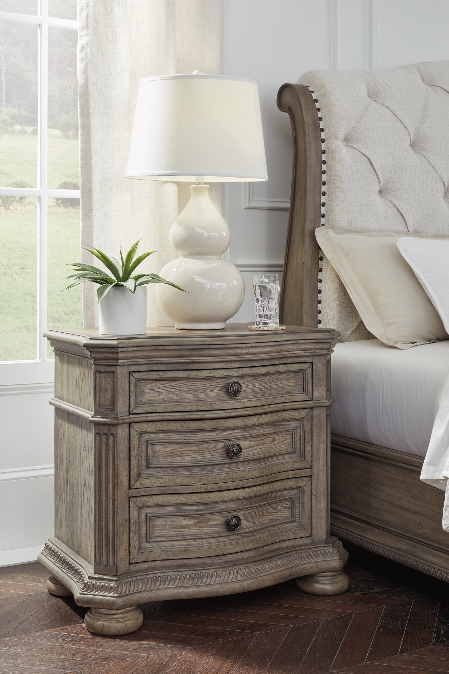 Ardenfield King Upholstered Sleigh Bed with Mirrored Dresser and Nightstand